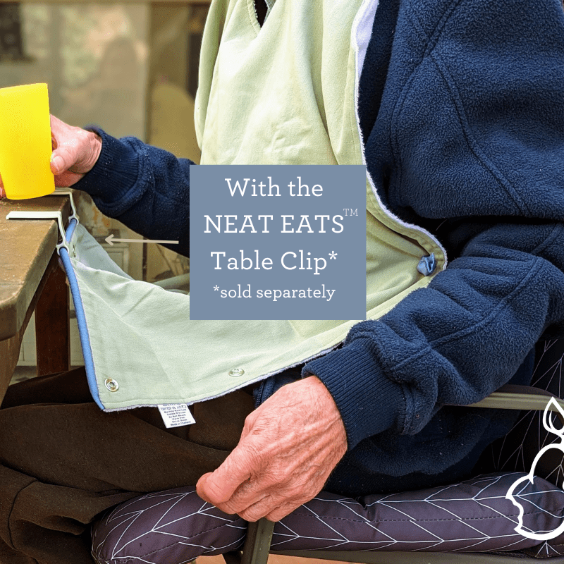 Neat Eats Adult Bib with Table Clip In use
