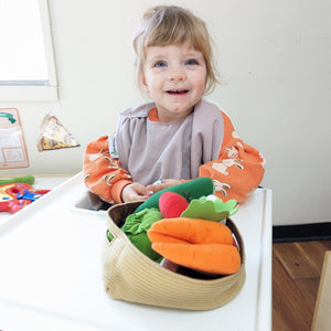 Baby Bib NEAT EATS in High Chair Pink